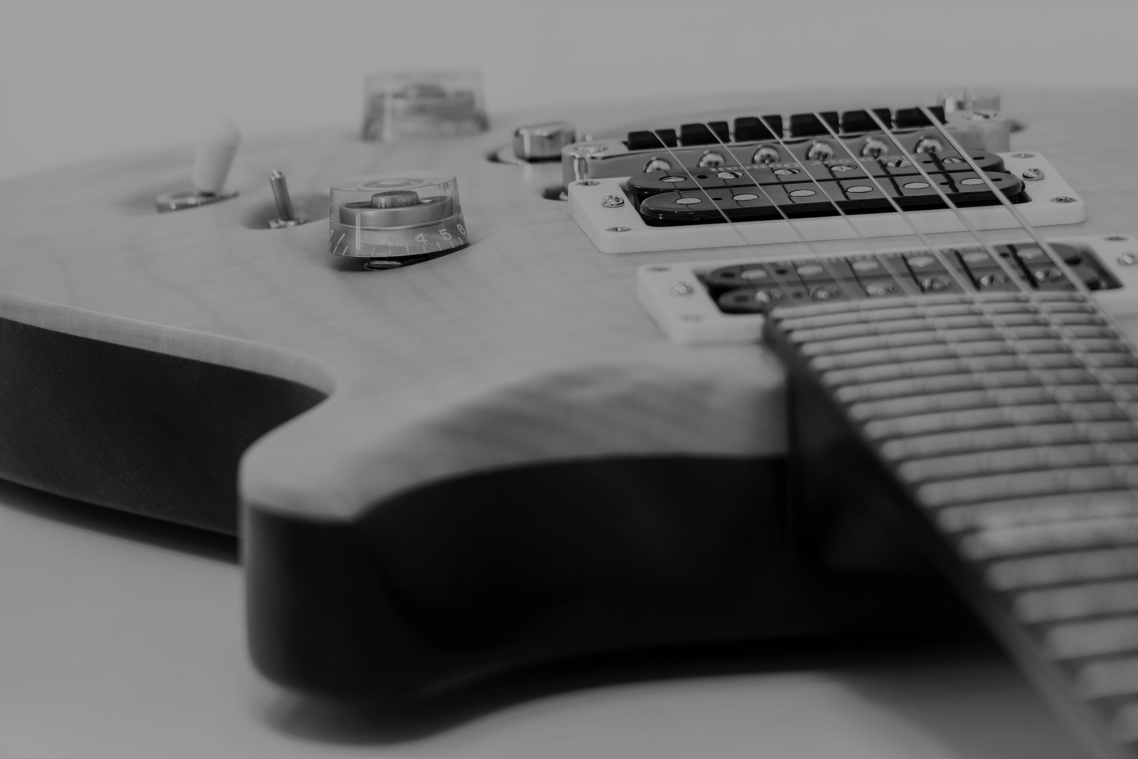 black and white photo of electric guitar